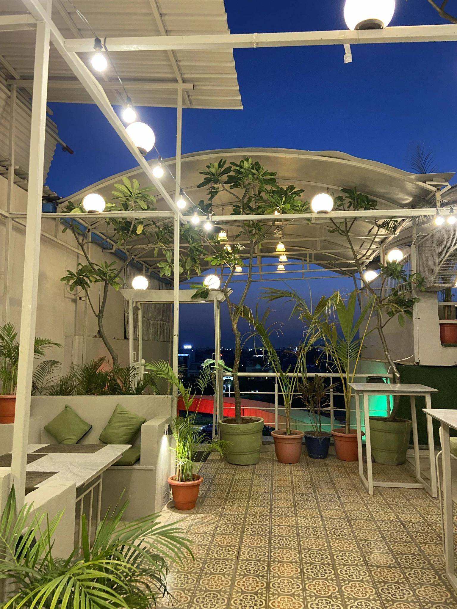 Club Clyrova rooftop walkway and city-view corner in Jaipur